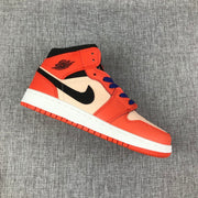 Jordan Air Jordan 1 Mid GS Sneakers in Pink and Orange